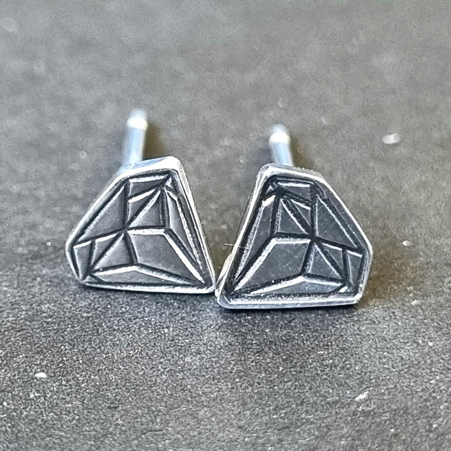Diamond Essence: Sterling Silver Diamond-Shaped Stud Earrings