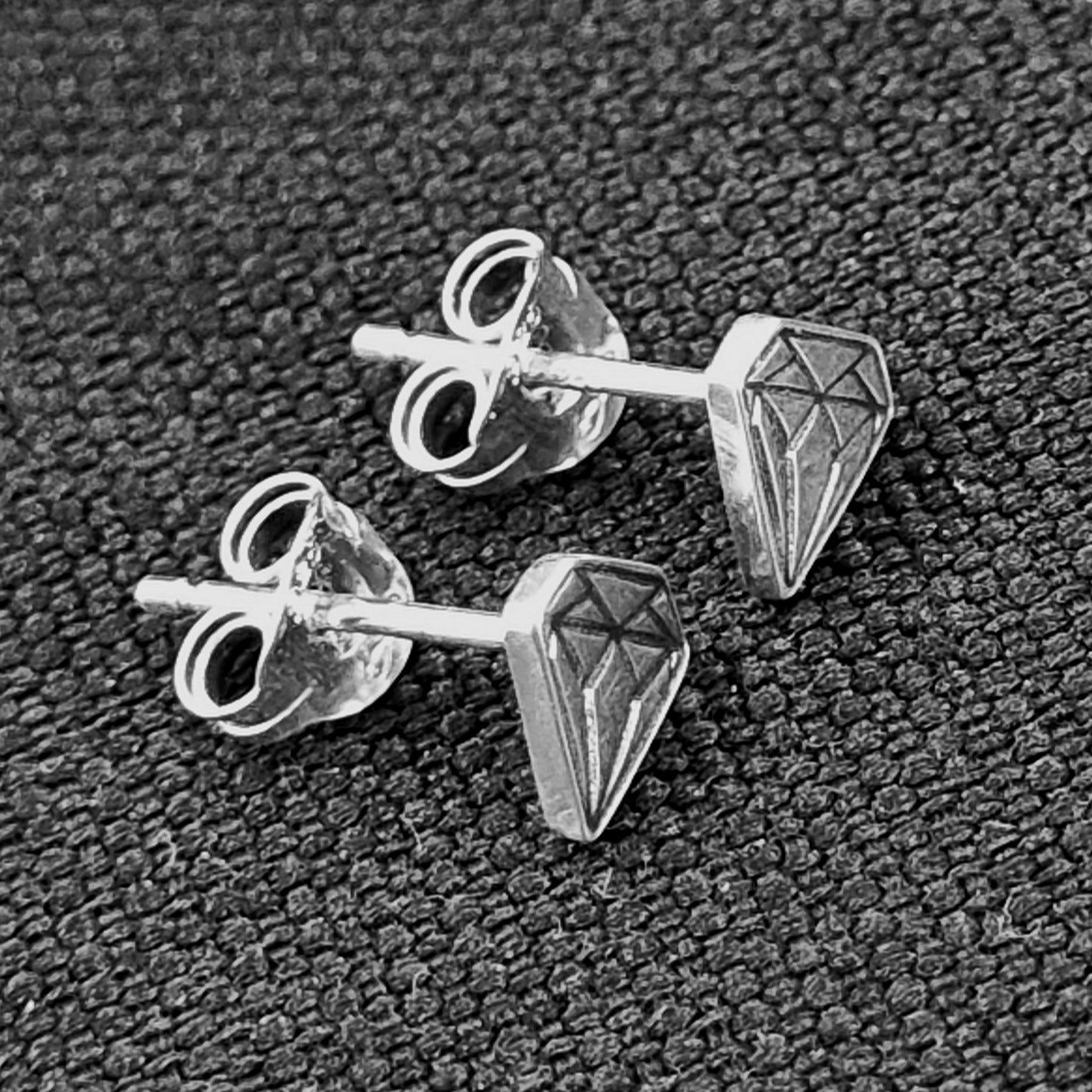 Diamond Essence – Sterling Silver Stud Earrings