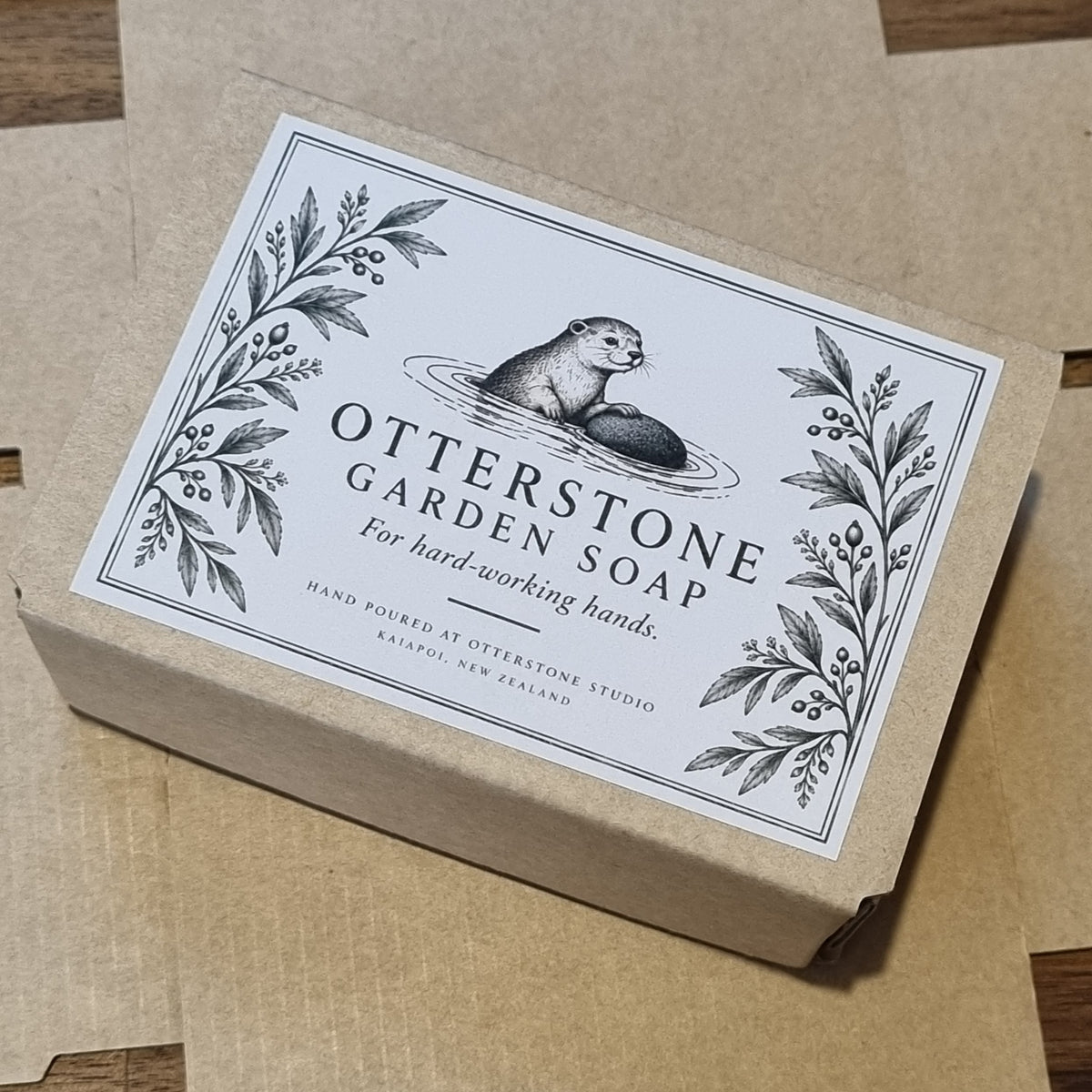 Otterstone Garden Soap in a kraft box with an illustrated otter label