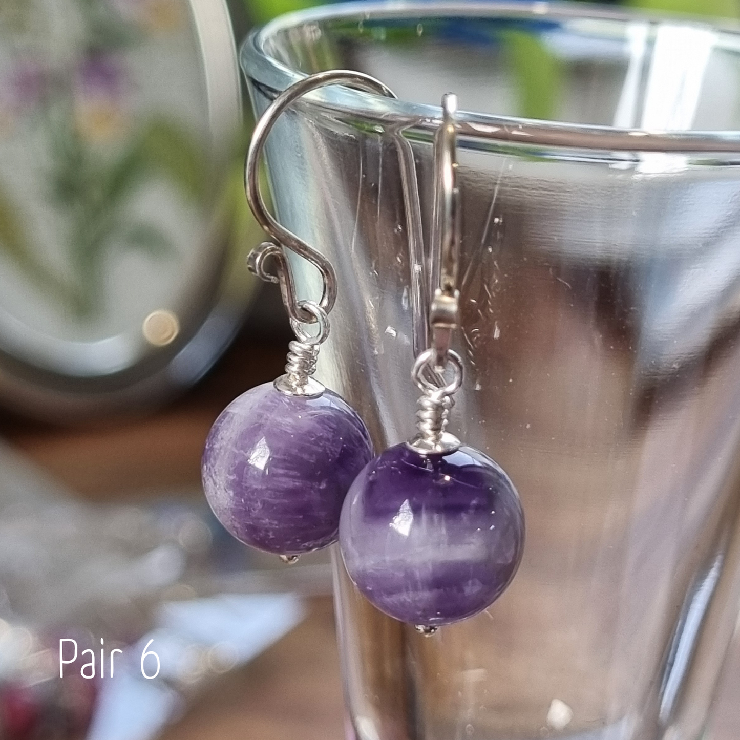 Banded amethyst drop earrings Pair 6 - deeper side showing purple tones on sterling silver hooks