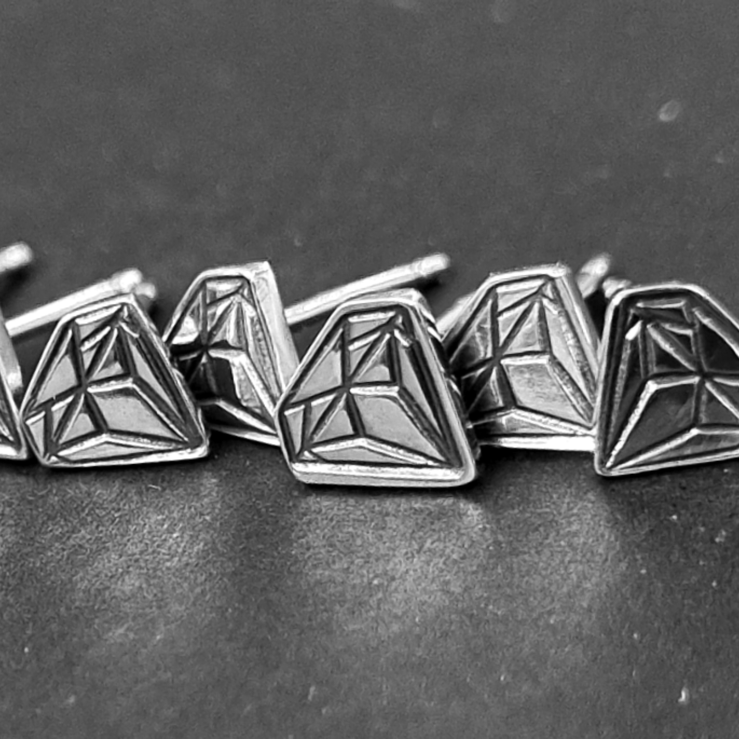 Diamond Essence – Sterling Silver Stud Earrings